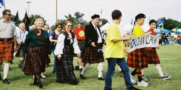 Honored Clan
                      leads parade