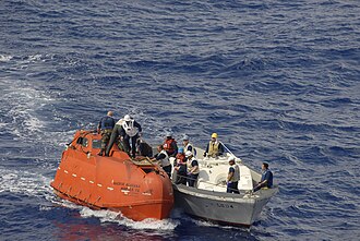 Rescue of Captain Phillips from lifeboat
                      taken by Somali pirates (Source:
https://commons.wikimedia.org/wiki/File:Defense.gov_News_Photo_090413-N-9150R-115.jpg)