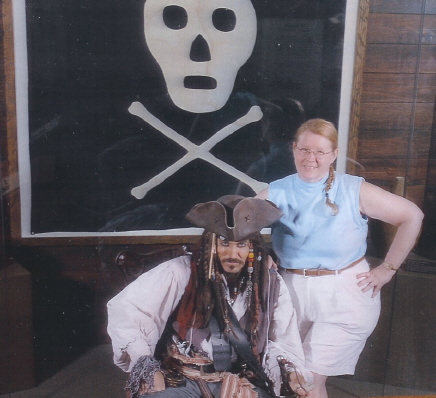 The Piratelady with Cap'n Johnny O' and the Jolly Roger