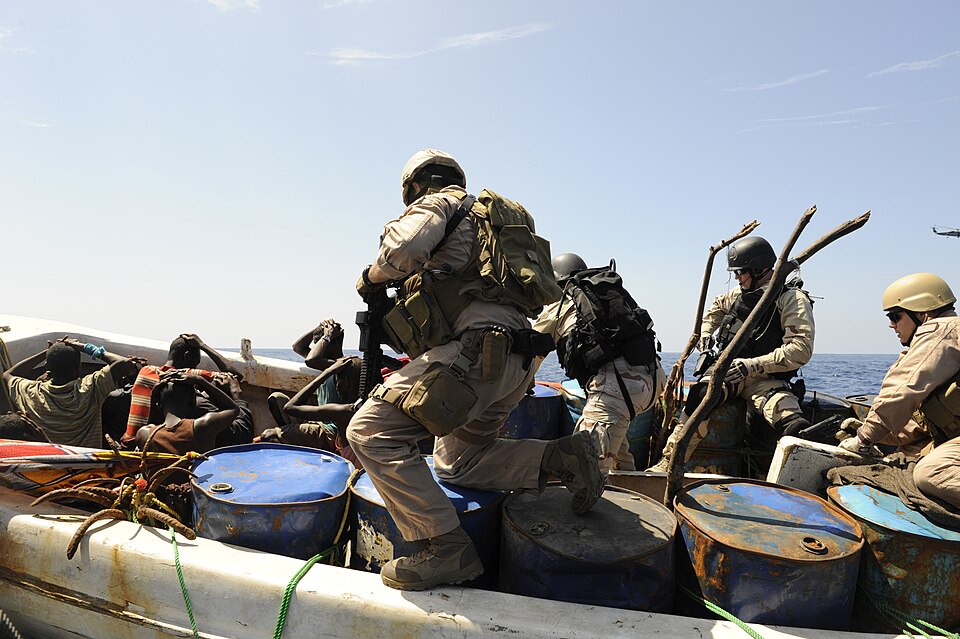 INDIAN OCEAN (March 31, 2010) Members of
                        the U.S. Coast Guard Law Enforcement Detachment
                        and Combined Task Force 151's visit board search
                        and seizure team, on board the Arleigh
                        Burke-class guided missile destroyer USS
                        Farragut (DDG 99) board a suspicious dhow. USS
                        Farragut is part of Combined Task Force 151, a
                        multinational task force established to conduct
                        anti-piracy operations in the Gulf of Aden.
                        (U.S. Navy Photo by Mass Communication
                        Specialist 1st Class Cassandra
                        Thompson/Released) (Source:
https://commons.wikimedia.org/wiki/File:US_Navy_100331-N-8959T-044_Members_of_the_U.S._Coast_Guard_Law_Enforcement_Detachment_and_Combined_Task_Force_151%27s_visit_board_search_and_seizure_team..jpg)