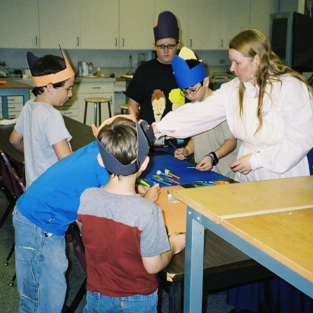 Young pirates gather to paint their
                              earrings